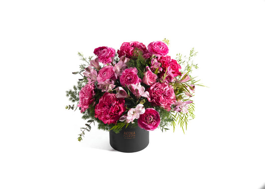 Flowerbox Ostuni con rose e fiori stagionali nei toni rosa e fucsia