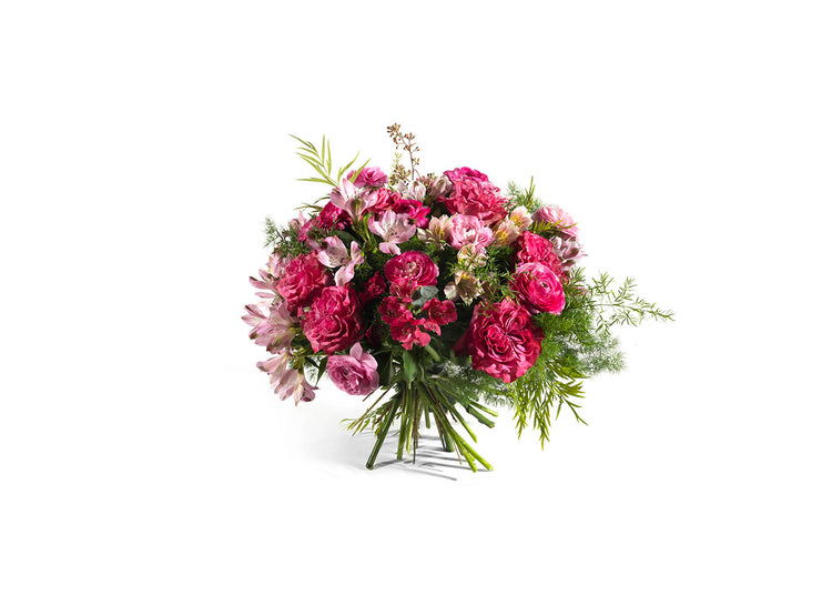 Bouquet Ostuni nei toni rosa e fucsia con rose e fiori stagionali